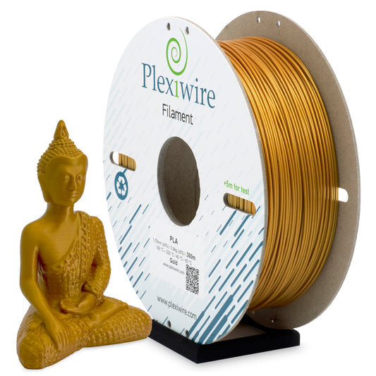 Gold PLA filament Plexiwire 1.75 mm on a cardboard spool with a 3D-printed gold Buddha figurine
