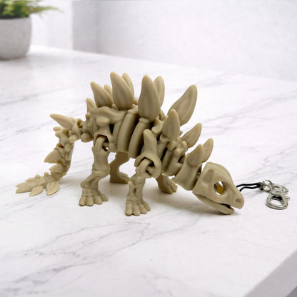 Skelett-Schlüsselanhänger | 3D-gedruckt Dinosaurier-Schlüsselanhänger | Flexibelr Wirbelsäulen-Schlüsselanhänger | Rucksackanhänger - Plexiwire 3D Drucke
