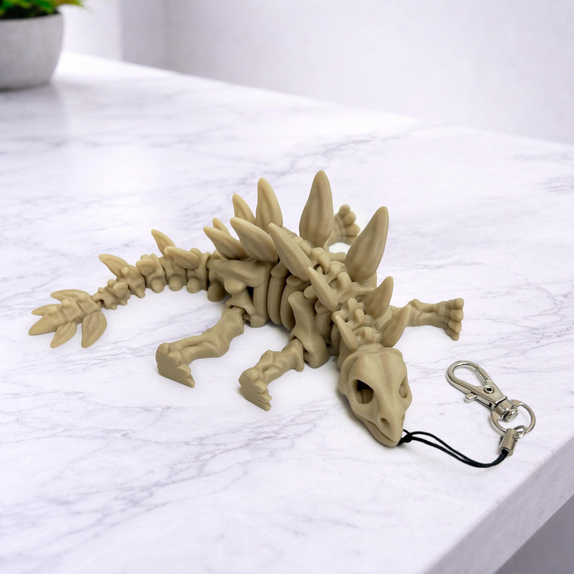Skelett-Schlüsselanhänger | 3D-gedruckt Dinosaurier-Schlüsselanhänger | Flexibelr Wirbelsäulen-Schlüsselanhänger | Rucksackanhänger - Plexiwire 3D Drucke